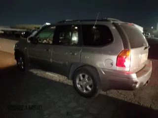 2002 GMC Envoy SLT with VIN 1GKDT13S522286497, listed as a Copart auction lot 84501384 with 207,226 mi miles and Salvage Title. Bid and sale history available at carsss.com. Image 2.