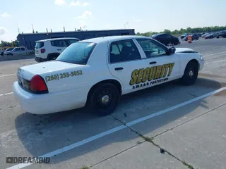 2009 Ford Police Interceptor with VIN 2FAHP71V99X141896, listed as a IAAI auction lot 39829556 with 1 mi miles. Bid and sale history available at carsss.com. Image 4.