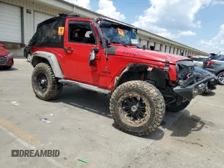2014 Jeep Wrangler Sport with VIN 1C4AJWAG4EL205584, listed as a Copart auction lot 63671245 with Not provided miles and Salvage title. Bid and sale history available at DreamBid. Image 4.