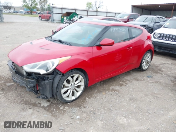 2013 Hyundai Veloster w/Gray Int z VIN KMHTC6AD8DU146035, wystawiony jako IAAI lot #41892703 z przebiegiem 241 169 mil mil oraz . Historia ofert i sprzedaży dostępna na DreamBid. Obrazek 2.