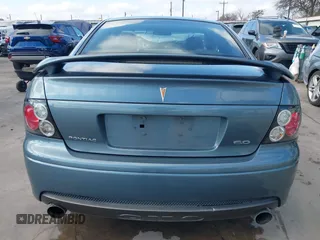 2006 Pontiac GTO with VIN 6G2VX12UX6L561098, listed as a IAAI auction lot 41487635 with 69,741 mi miles. Bid and sale history available at carsss.com. Image 16.