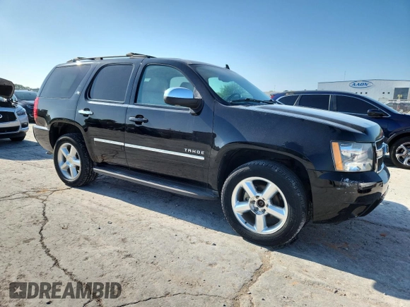 2014 Chevrolet Tahoe LTZ with VIN 1GNSKCE09ER116627, listed as a Copart auction lot 64214685 with 240,970 mi miles and Clean title. Bid and sale history available at DreamBid. Image 4.