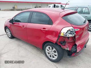 2015 Kia Rio LX with VIN KNADM5A34F6517123, listed as a IAAI auction lot 42125593 with 138,214 mi miles. Bid and sale history available at carsss.com. Image 3.
