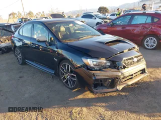 2021 Subaru WRX STI with VIN JF1VA2E60M9809758, listed as a IAAI auction lot 41243170 with 67,104 mi miles. Bid and sale history available at carsss.com. Image 1.