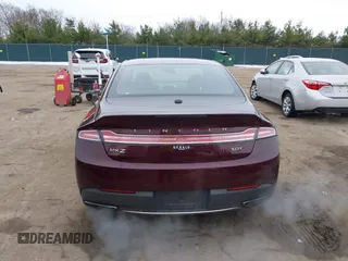 2017 Lincoln MKZ Select z VIN 3LN6L5CC3HR620854, wystawiony jako IAAI lot #41042376 z przebiegiem 131 517 mil mil oraz . Historia ofert i sprzedaży dostępna na DreamBid. Obrazek 16.