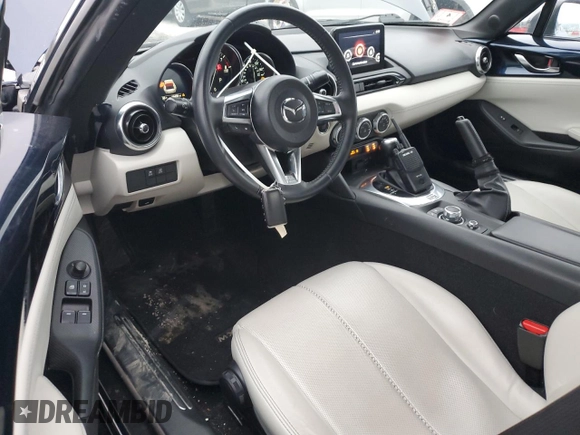 2021 Mazda MX-5 Miata Grand Touring with VIN JM1NDAM77M0454582, listed as a Copart auction lot 44959535 with 44,438 mi miles and Salvage title. Bid and sale history available at DreamBid. Image 8.