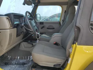 2003 Jeep Wrangler Sahara with VIN 1J4FA59S03P313418, listed as a Copart auction lot 64883094 with 184,658 mi miles and Salvage title. Bid and sale history available at DreamBid. Image 7.