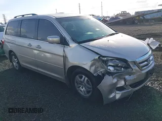 2006 Honda Odyssey EX-L z VIN 5FNRL38766B456161, wystawiony jako IAAI lot #38263697 z przebiegiem 203 032 mil mil oraz . Historia ofert i sprzedaży dostępna na DreamBid. Obrazek 1.