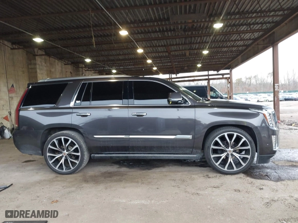 2017 Cadillac Escalade Premium Luxury with VIN 1GYS3CKJ0HR263565, listed as a IAAI auction lot 41615401 with 105,773 mi miles. Bid and sale history available at carsss.com. Image 14.