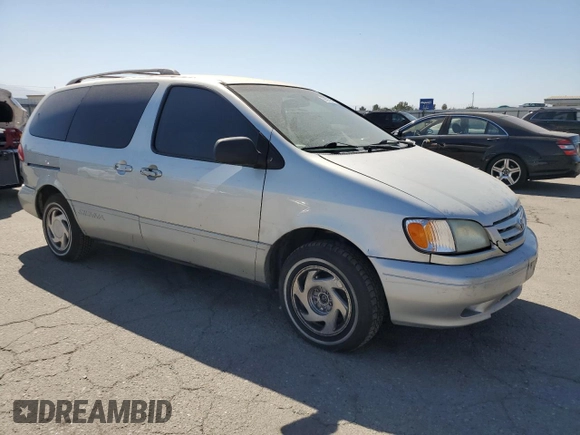 2002 Toyota Sienna LE with VIN 4T3ZF13CX2U458385, listed as a Copart auction lot 69523254 with 187,836 mi miles and Salvage Title. Bid and sale history available at carsss.com. Image 4.