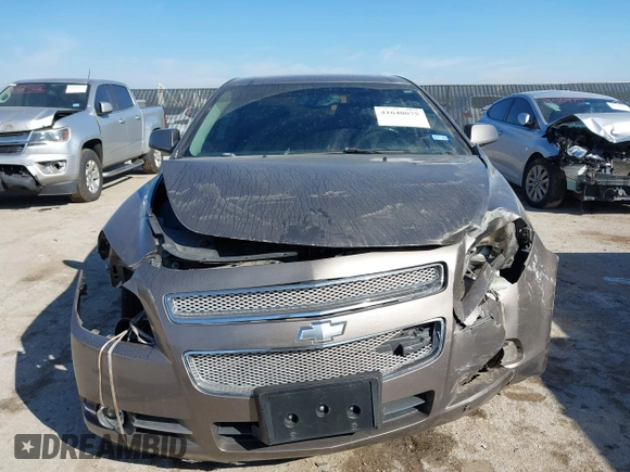 2012 Chevrolet Malibu LTZ with VIN 1G1ZG5E74CF133103, listed as a IAAI auction lot 41640075 with 173,692 mi miles and . Bid and sale history available at DreamBid. Image 12.