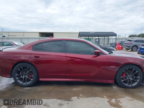 2020 Dodge Charger Scat Pack z VIN 2C3CDXGJ8LH132985, wystawiony jako IAAI lot #41316849 z przebiegiem 66 881 mil mil oraz . Historia ofert i sprzedaży dostępna na DreamBid. Obrazek 13.