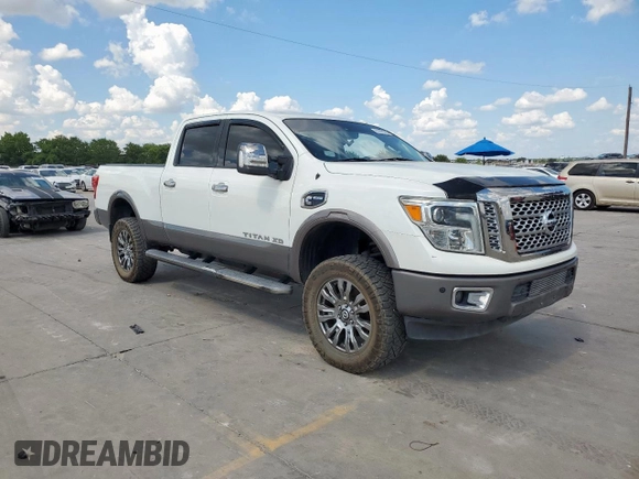 2016 Nissan Titan Platinum Reserve with VIN 1N6BA1F48GN515859, listed as a Copart auction lot 61955385 with 80,858 mi miles and Clean title. Bid and sale history available at DreamBid. Image 4.
