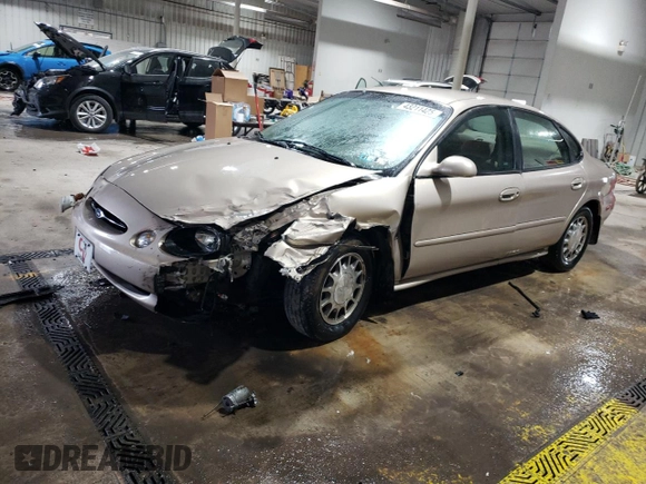 1999 Ford Taurus SE with VIN 1FAFP53S6XA242981, listed as a Copart auction lot 43211425 with 111,966 mi miles and Salvage title. Bid and sale history available at DreamBid. Image 1.