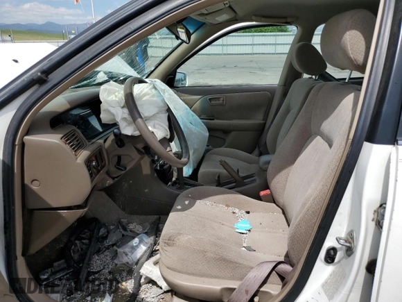 2000 Toyota Camry CE с VIN JT2BG22K1Y0403018, выставлен на аукционе Copart как лот 58325535 с пробегом Не указан миль и На запчасти • Non repairable. История ставок и продаж доступна на DreamBid. Изображение 7.