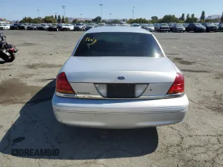 2000 Ford Crown Victoria Police Police Interceptor with VIN 2FAFP71W4YX119755, listed as a Copart auction lot 68950904 with 208,260 mi miles and Salvage Title. Bid and sale history available at carsss.com. Image 6.