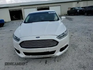 2015 Ford Fusion SE z VIN 3FA6P0HD3FR109984, wystawiony jako Copart lot #59847705 z przebiegiem 152 480 mil mil oraz Szkoda całkowita • Salvage title. Historia ofert i sprzedaży dostępna na DreamBid. Obrazek 13.