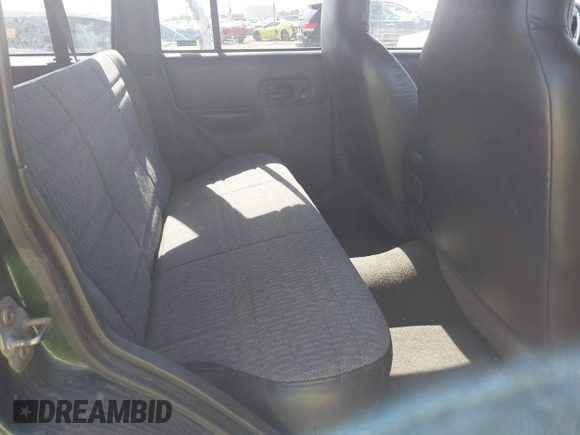 2001 Jeep Cherokee Sport z VIN 1J4FF48S81L513478, wystawiony jako IAAI lot #42245905 z przebiegiem 162 219 mil mil oraz . Historia ofert i sprzedaży dostępna na DreamBid. Obrazek 8.