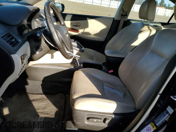 2010 Lexus HS 250h with VIN JTHBB1BA1A2017523, listed as a Copart auction lot 80086154 with 125,421 mi miles and Salvage Title. Bid and sale history available at DreamBid. Image 7.