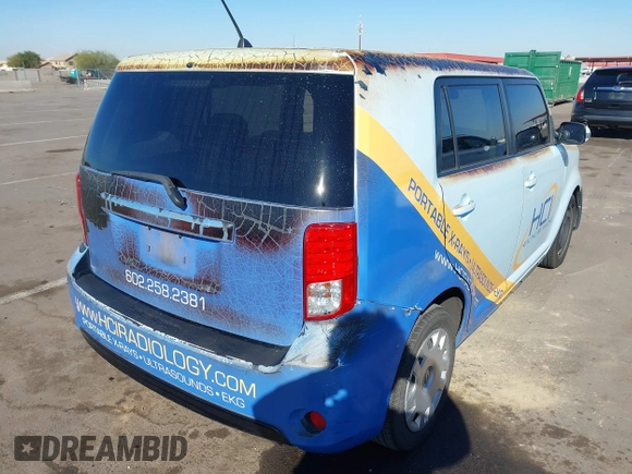 2015 Scion xB with VIN JTLZE4FE3FJ069274, listed as a IAAI auction lot 41322994 with 228,651 mi miles. Bid and sale history available at carsss.com. Image 4.
