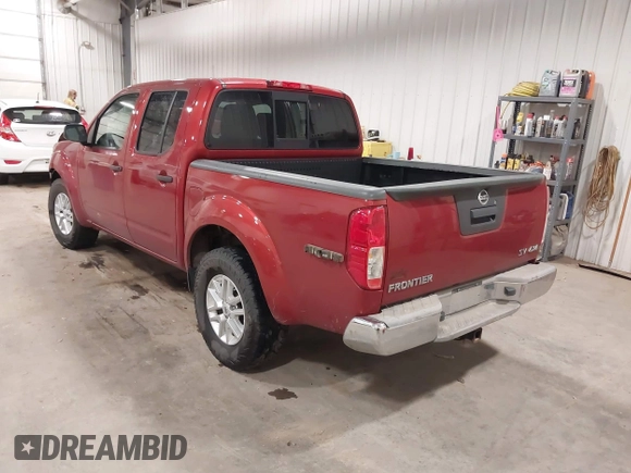 2014 Nissan Frontier S with VIN 1N6AD0EV6EN708600, listed as a IAAI auction lot 42296112 with 112,737 mi miles and . Bid and sale history available at DreamBid. Image 3.
