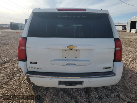 2018 Chevrolet Tahoe Premier with VIN 1GNSKCKC5JR196310, listed as a Copart auction lot 48050205 with 101,300 mi miles and Salvage title. Bid and sale history available at DreamBid. Image 6.