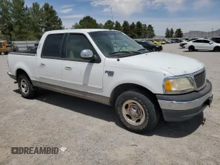 2001 Ford F-150 XLT with VIN 1FTRW07W41KA62569, listed as a Copart auction lot 56783475 with 222,630 mi miles and Clean title. Bid and sale history available at DreamBid. Image 4.