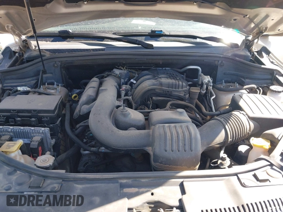 2014 Dodge Durango SXT with VIN 1C4RDJAG0EC455787, listed as a IAAI auction lot 42651627 with 103,218 mi miles and . Bid and sale history available at DreamBid. Image 10.