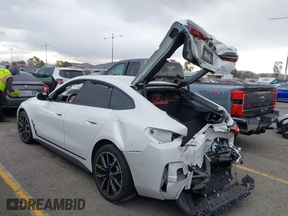 2023 BMW i4 eDrive40 z VIN WBY73AW05PFR28279, wystawiony jako IAAI lot #41262952 z przebiegiem 40 011 mil mil oraz . Historia ofert i sprzedaży dostępna na DreamBid. Obrazek 3.