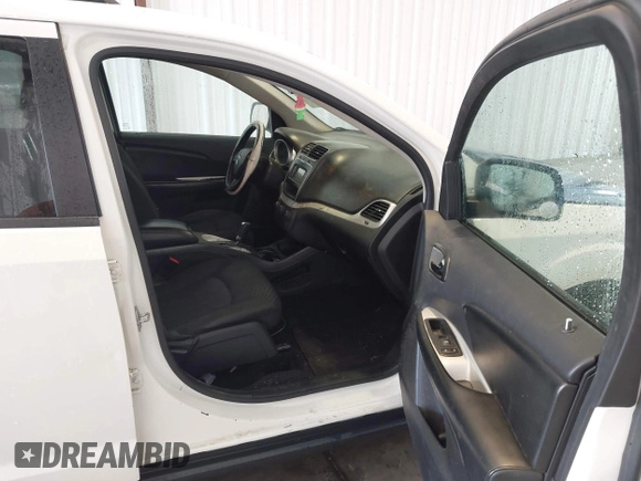 2019 Dodge Journey SE with VIN 3C4PDCBBXKT835029, listed as a IAAI auction lot 42120482 with 130,282 mi miles and . Bid and sale history available at DreamBid. Image 5.
