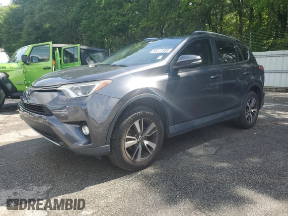 2018 Toyota RAV4 XLE with VIN JTMWFREV5JJ747297, listed as a Copart auction lot 56371505 with 215,598 mi miles and Clean Title. Bid and sale history available at DreamBid. Image 2.