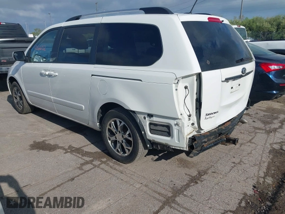 2014 Kia Sedona LX with VIN KNDMG4C75E6545483, listed as a IAAI auction lot 42166152 with 121,827 mi miles and . Bid and sale history available at carsss.com. Image 3.