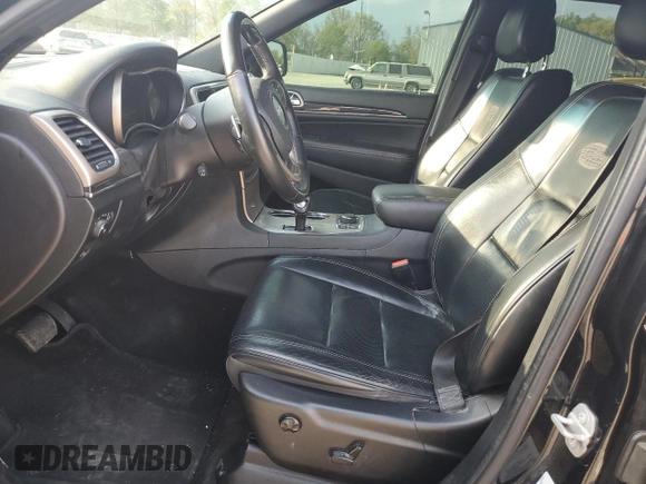 2015 Jeep Grand Cherokee High Altitude with VIN 1C4RJFCG8FC878265, listed as a Copart auction lot 55044325 with 157,829 mi miles and Salvage title. Bid and sale history available at DreamBid. Image 7.