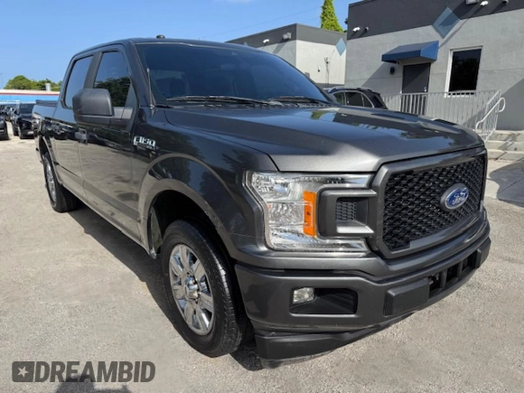 2019 Ford F-150 XL with VIN 1FTEW1CP1KKF22890, listed as a Copart auction lot 61813095 with 63,774 mi miles and Salvage title. Bid and sale history available at DreamBid. Image 4.