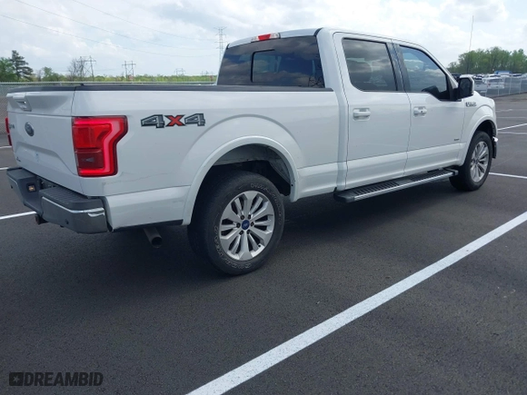 2015 Ford F-150 XLT w/HD Payload Pkg with VIN 1FTFW1EGXFFB88326, listed as a IAAI auction lot 41972016 with 204,767 mi miles. Bid and sale history available at carsss.com. Image 4.