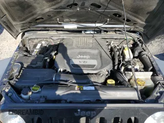 2016 Jeep Wrangler Unlimited Sport z VIN 1C4BJWDG5GL134169, wystawiony jako Copart lot #53517145 z przebiegiem 129 824 mil mil oraz Szkoda całkowita • Salvage title. Historia ofert i sprzedaży dostępna na DreamBid. Obrazek 11.