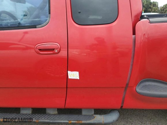 2003 Ford F-150 XL with VIN 1FTRX07243KB72082, listed as a Copart auction lot 74593004 with 0 mi miles and Salvage Title. Bid and sale history available at carsss.com. Image 12.