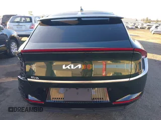 2023 Kia EV6 Wind with VIN KNDC3DLC6P5153657, listed as a IAAI auction lot 40943487 with 10,655 mi miles and . Bid and sale history available at DreamBid. Image 17.