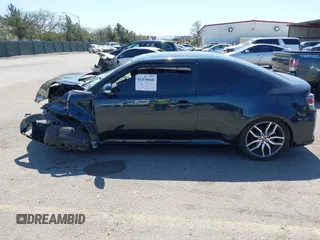 2015 Scion tC with VIN JTKJF5C77F3094936, listed as a IAAI auction lot 41830668 with 89,727 mi miles. Bid and sale history available at carsss.com. Image 15.