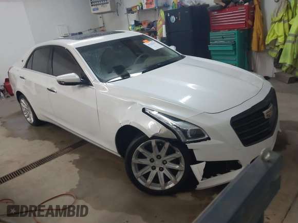 2015 Cadillac CTS Luxury AWD with VIN 1G6AX5SX5F0117267, listed as a IAAI auction lot 41762217 with 79,930 mi miles and . Bid and sale history available at DreamBid. Image 1.