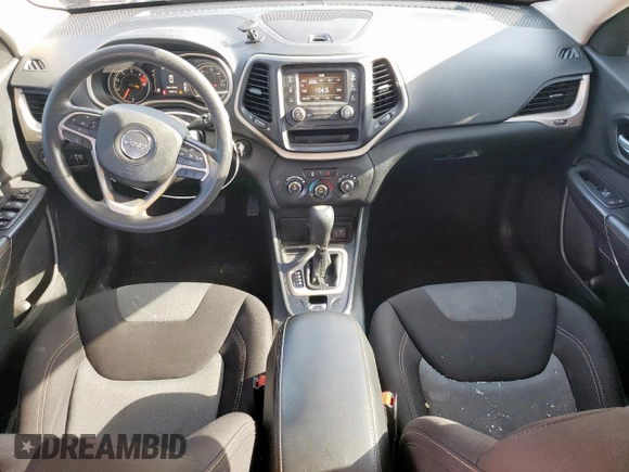 2016 Jeep Cherokee Sport with VIN 1C4PJLAB3GW287953, listed as a Copart auction lot 61077905 with 99,681 mi miles and Salvage title. Bid and sale history available at DreamBid. Image 8.