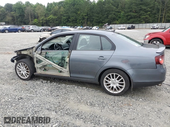 2008 Volkswagen Jetta Wolfsburg Edition with VIN 3VWRJ71K98M126974, listed as a Copart auction lot 58475155 with 115,038 mi miles and Salvage title. Bid and sale history available at DreamBid. Image 2.