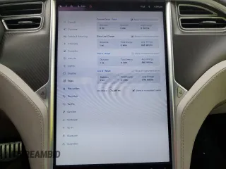 2015 Tesla Model S 85D with VIN 5YJSA1H42FF089907, listed as a Copart auction lot 53964335 with 70,386 mi miles and Salvage Title. Bid and sale history available at carsss.com. Image 9.