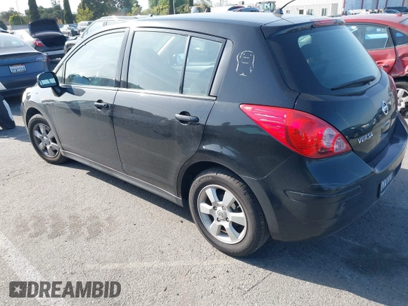 2009 Nissan Versa 1.8 SL with VIN 3N1BC13E79L406566, listed as a IAAI auction lot 41900375 with 109,470 mi miles. Bid and sale history available at carsss.com. Image 3.