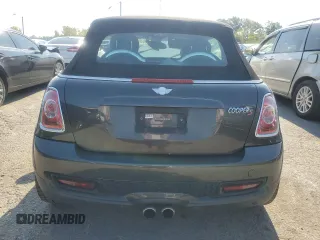 2014 MINI Convertible S с VIN WMWZP3C52ET706661, выставлен на аукционе Copart как лот 70040934 с пробегом 65 484 миль миль и Списание • Salvage title. История ставок и продаж доступна на DreamBid. Изображение 6.