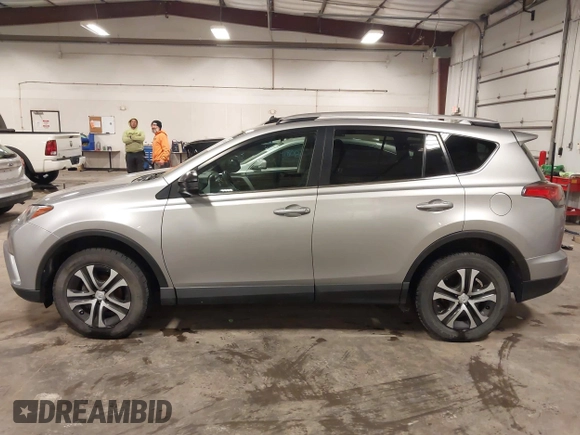 2016 Toyota RAV4 LE with VIN 2T3BFREV8GW509257, listed as a IAAI auction lot 41807349 with 216,031 mi miles. Bid and sale history available at carsss.com. Image 14.