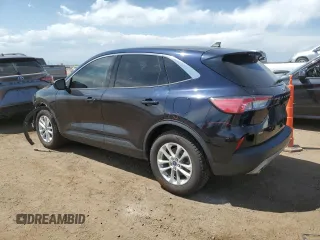 2021 Ford Escape SE with VIN 1FMCU9G66MUA94797, listed as a Copart auction lot 60864235 with 64,712 mi miles and Salvage title. Bid and sale history available at DreamBid. Image 2.