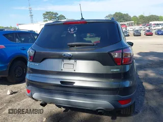 2017 Ford Escape SE z VIN 1FMCU0GDXHUB66813, wystawiony jako IAAI lot #42056150 z przebiegiem 86 915 mil mil oraz . Historia ofert i sprzedaży dostępna na DreamBid. Obrazek 16.
