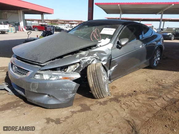 2009 Honda Accord Cpe EX-L with VIN 1HGCS22889A012587, listed as a IAAI auction lot 41641266 with 185,409 mi miles. Bid and sale history available at carsss.com. Image 2.