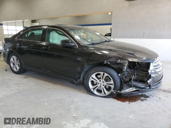 2014 Ford Taurus SEL z VIN 1FAHP2E84EG112877, wystawiony jako Copart lot #52612065 z przebiegiem 103 306 mil mil oraz Szkoda całkowita • Salvage title. Historia ofert i sprzedaży dostępna na DreamBid. Obrazek 4.